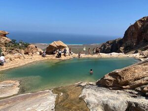 A swim in a natural lake in the middle of the landscape.