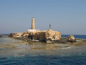 Headland that protrudes into the sea with a lighthouse