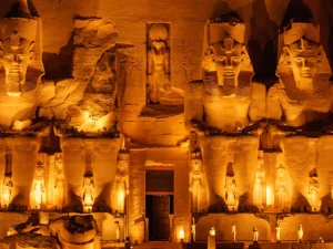 Statue in front of the Great Temple of Ramses II at Abu Simbel at night