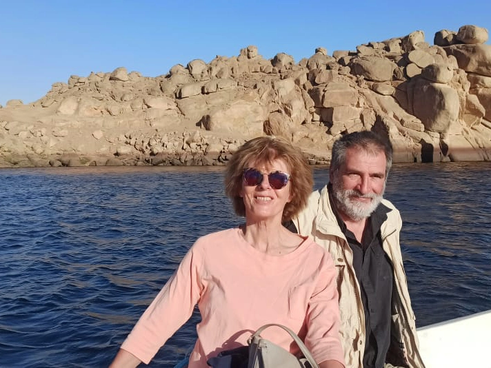 Couple on a boat with Nile River behind them